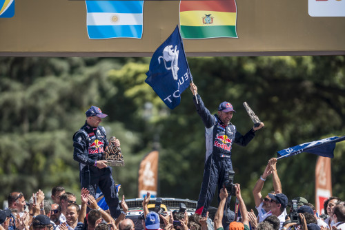 Stephane Peterhansel (FRA) of Team Peugeot-Total celebrates at the podium of Rally Dakar 2016 in Rosario, Argentina on January 16th, 2016